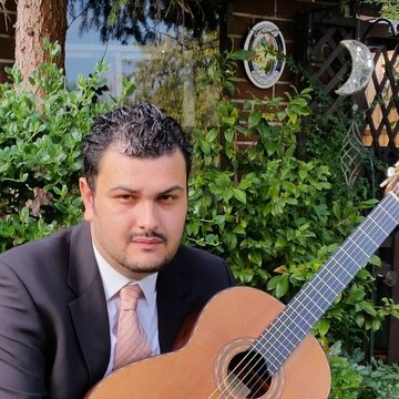Hire Justin Rogers Classical guitarist with Encore