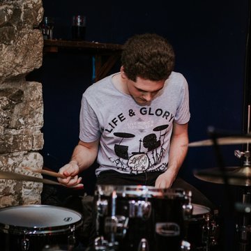 Hire David Vellacott Drummer with Encore