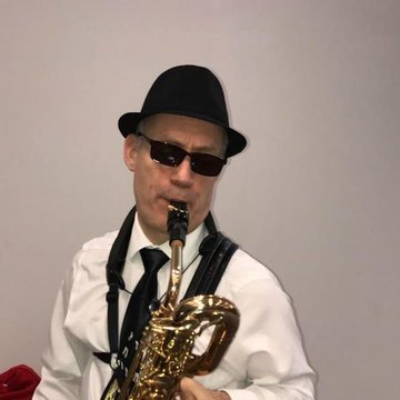 Hire Andrew Bruell Baritone saxophonist with Encore