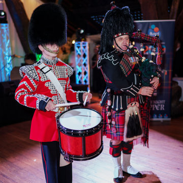 Hire Bonnet & Bearskin Bagpiper with Encore