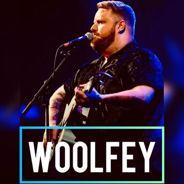 Hire Woolfey  Singing guitarist with Encore