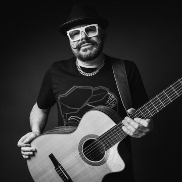 Hire Tim Scott Guitar | Unique Live Guitar DJ Show Composer with Encore