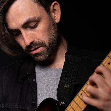 Hire Luke Godwin Electric guitarist with Encore