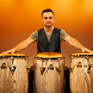 Hire Joeconga Percussionist with Encore