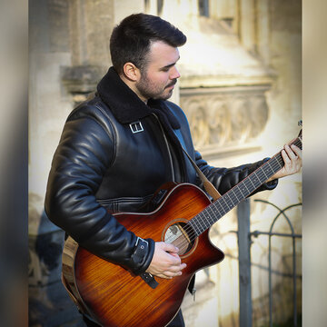 Hire Connah Ross Singing guitarist with Encore