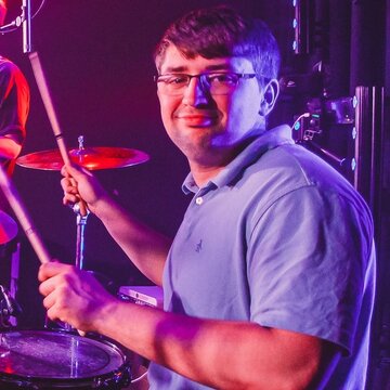 Hire Sam Tempest Drummer with Encore