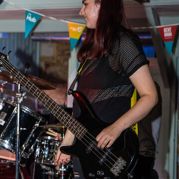 Hire Emily Toman Bass guitarist with Encore