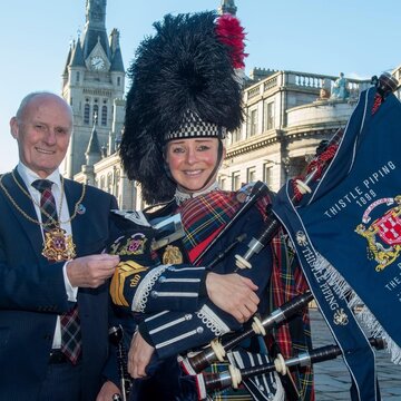 Hire Thistle Piping - Pipe Major Julie Brinklow Bagpiper with Encore