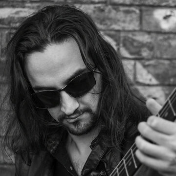 Hire Tamás Varga Guitarist with Encore