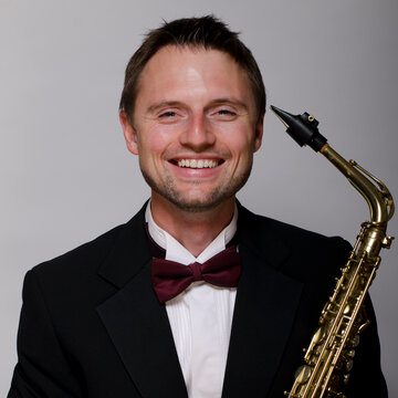 Hire Sussax Alto saxophonist with Encore