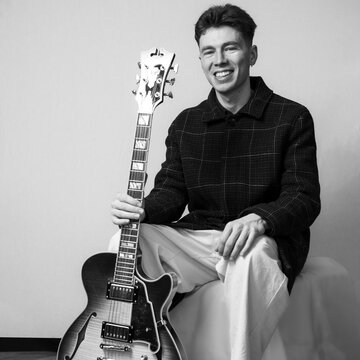 Hire Tristan Cole Electric guitarist with Encore