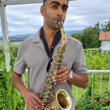 Hire Adrian  Alto saxophonist with Encore
