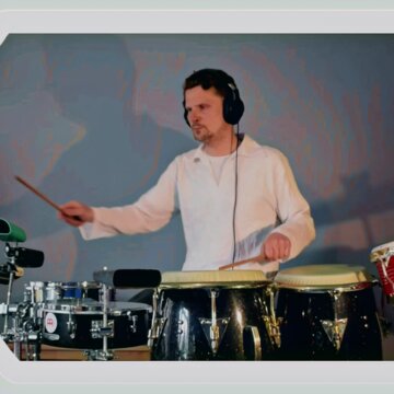 Hire Tadeusz Palosz Percussionist with Encore