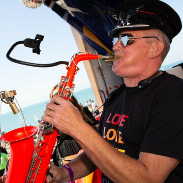 Hire Mercury Sax Percussionist with Encore