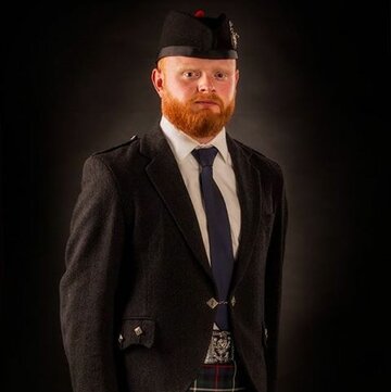 Hire Norman Gillies Bagpiper with Encore