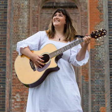 Hire Isobel - Singer & Guitarist  Singing guitarist with Encore