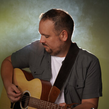 Hire Rick Miles Singing guitarist with Encore