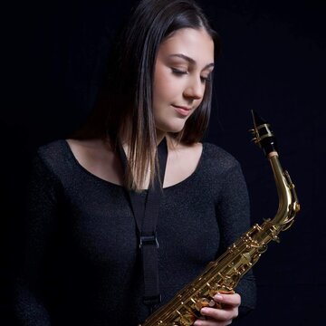 Hire Music with Eve Alto saxophonist with Encore