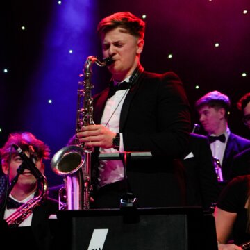 Hire Isaac Craig Alto saxophonist with Encore