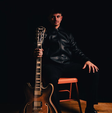 Hire Devon Salinas Singing guitarist with Encore