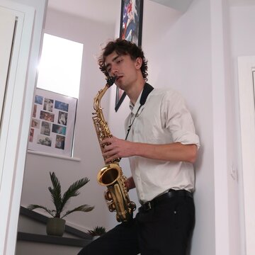 Hire Saxophonist Matt Landi  Tenor saxophonist with Encore