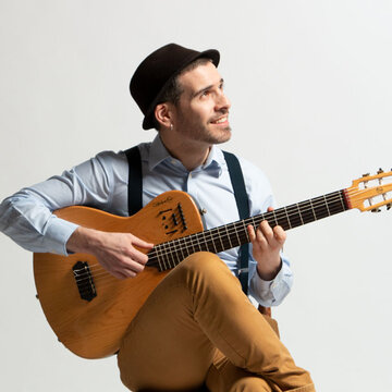 Hire BOSSA NOVA - SÉRGIO PRAZERES / SOLO Guitarist with Encore