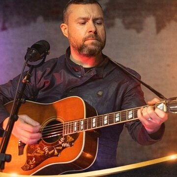 Hire Mick Thomas Music Ent Singing guitarist with Encore