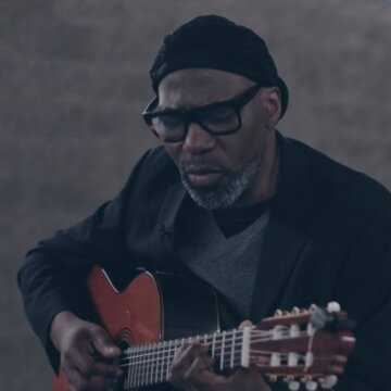 Hire Ade Onayiga Singing guitarist with Encore
