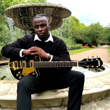 Hire Tami Guitarist with Encore