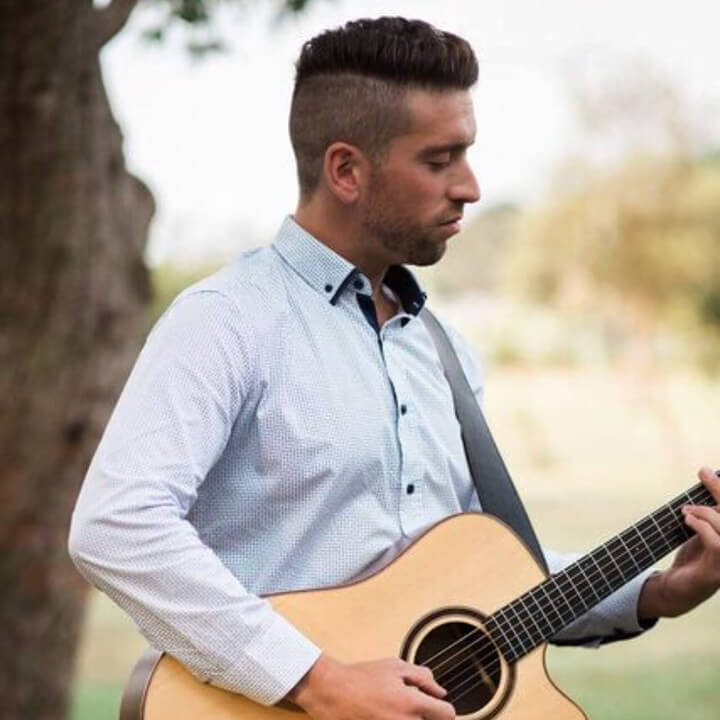 Hire Adrian Joseph Singing guitarist with Encore
