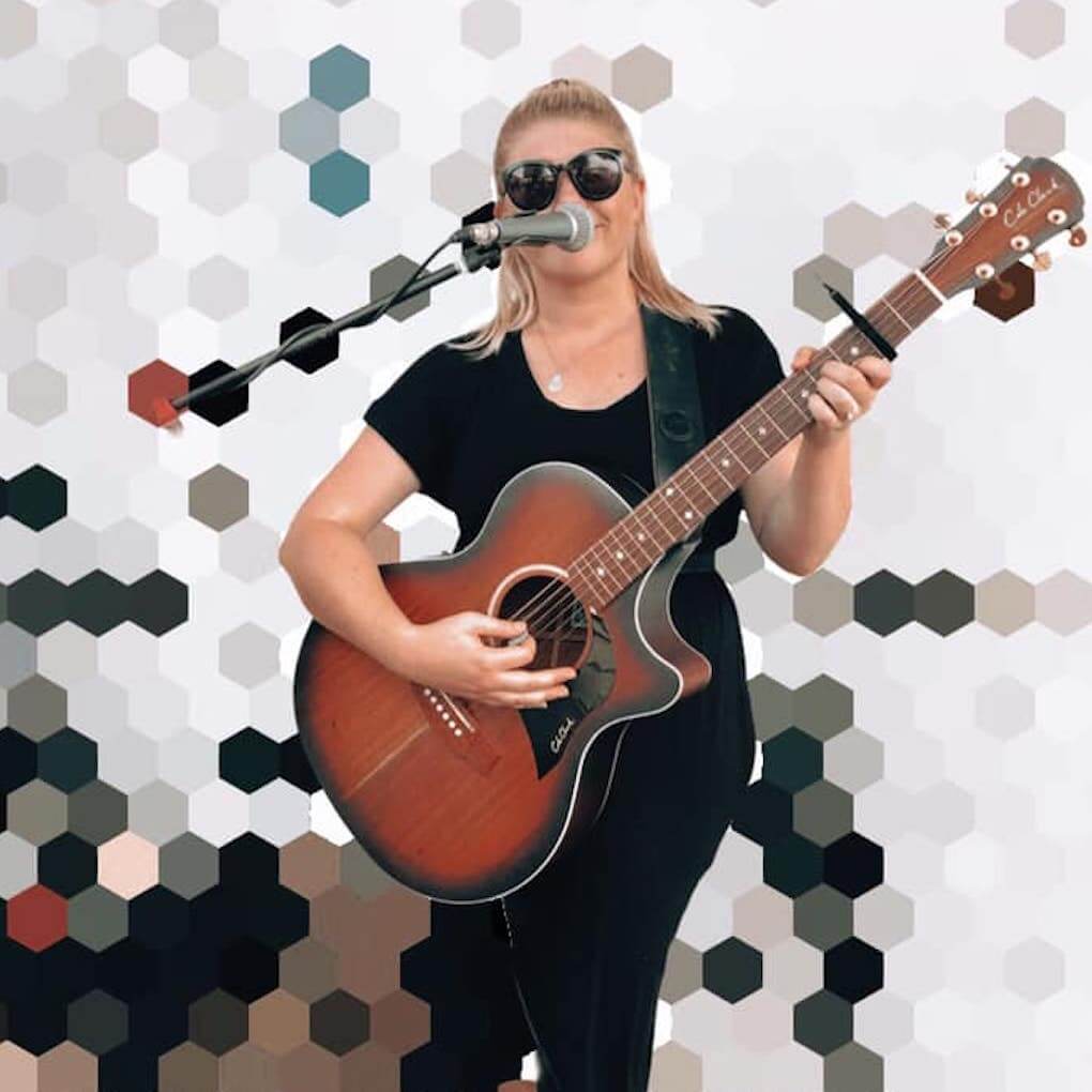 Hire Amy Varley Singing guitarist with Encore