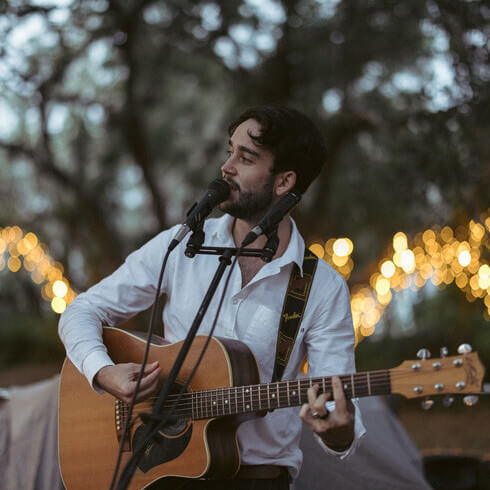 Hire Kyle Bryant Singing guitarist with Encore