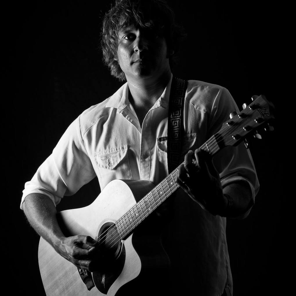 Hire Rick Barron Singing guitarist with Encore