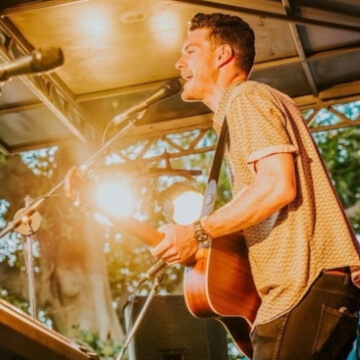 Hire Sam Higginson Singing guitarist with Encore