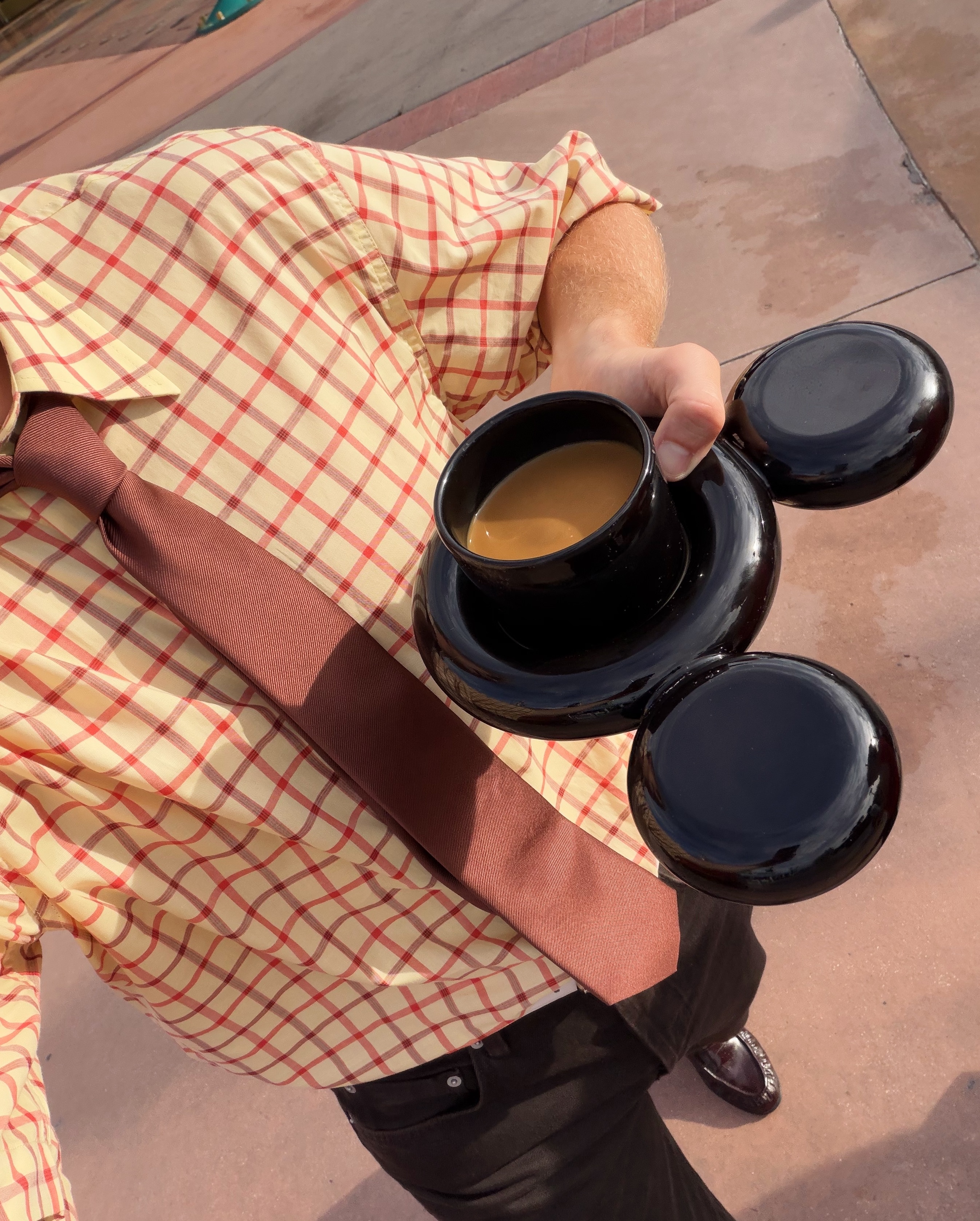 Gustaf Westman at Disneyland Paris with Mickey Cup.jpg