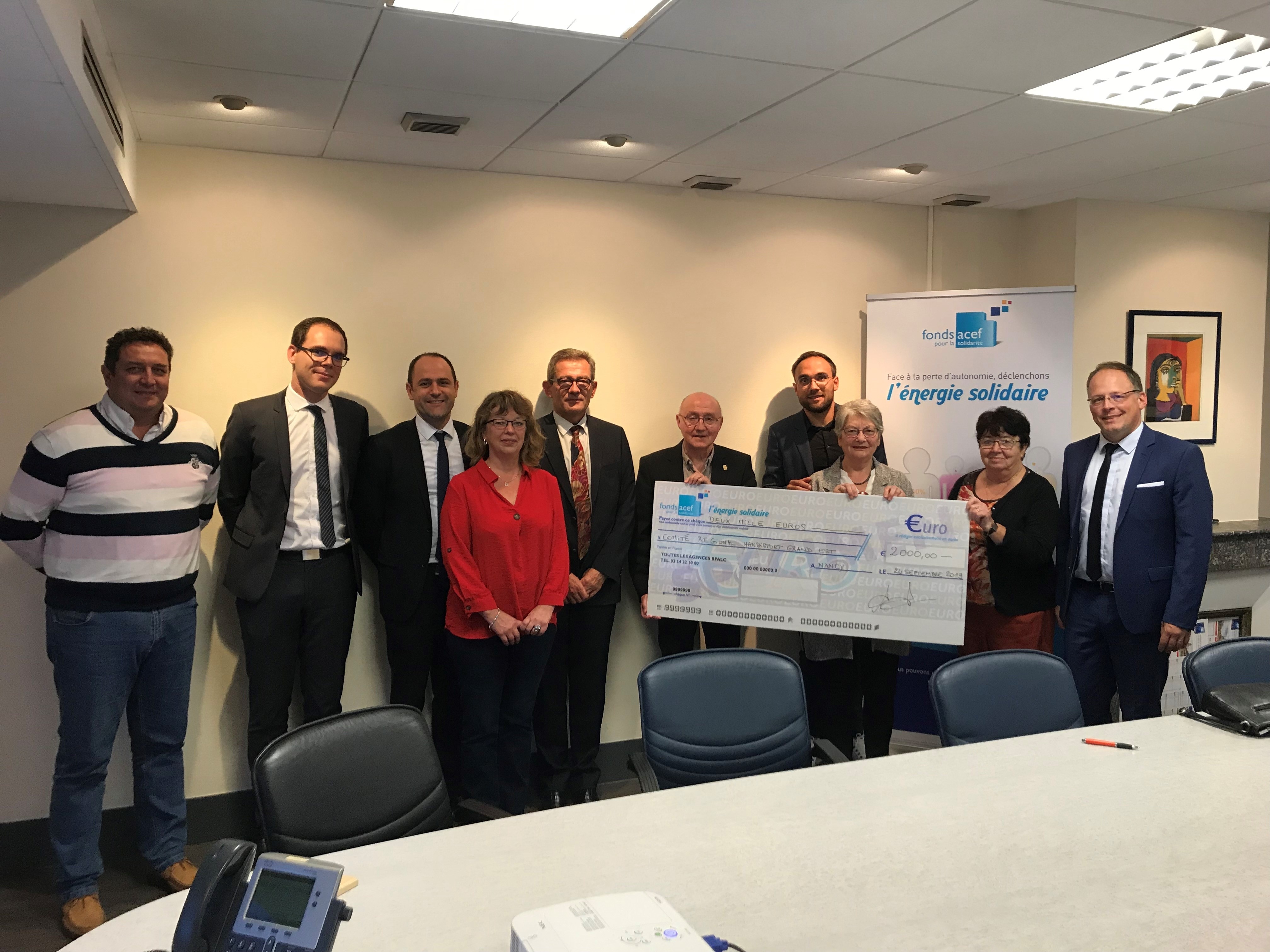 Remise d'un chèque de 2 000 euros au CRHGE (Comité Régional Handisport Grand Est)