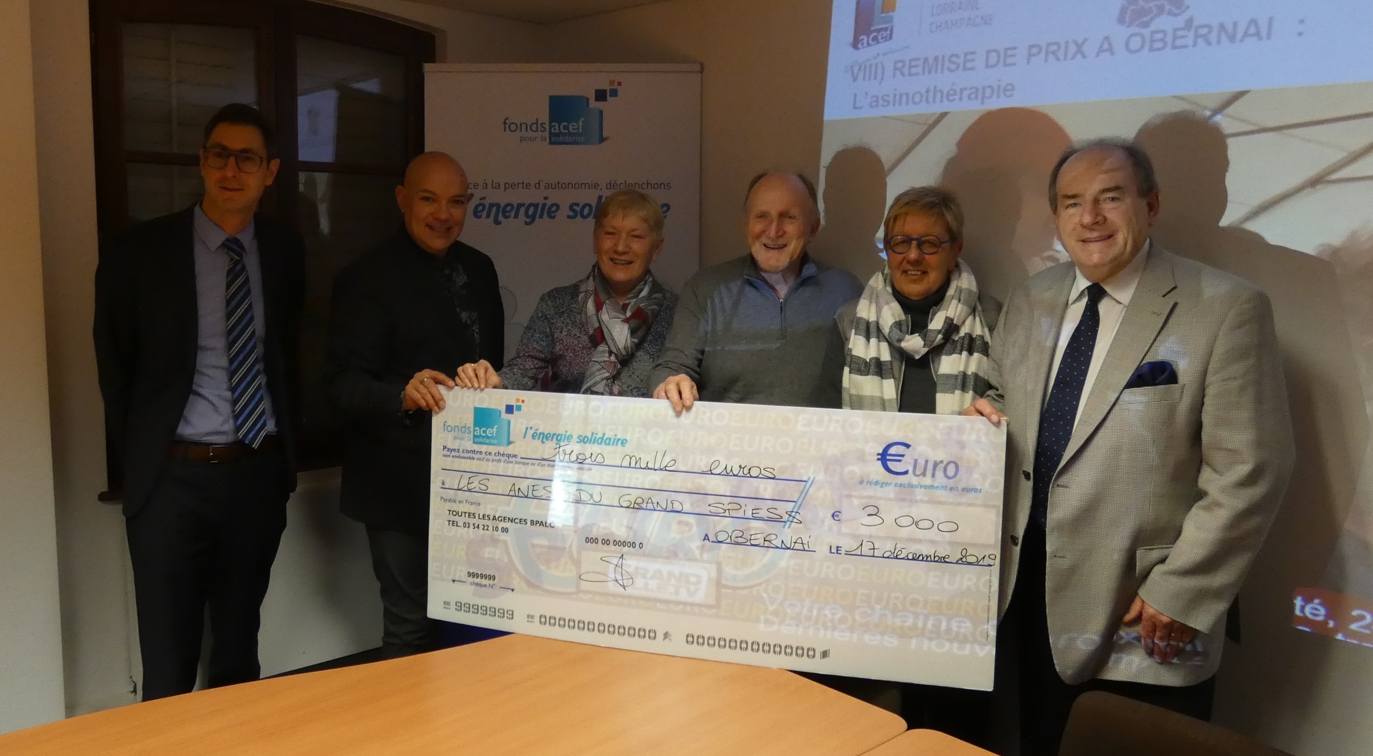 Photo de la remise du FONDS ACEF pour la Solidarité à l'association "Les Anes du Grand Spiess"