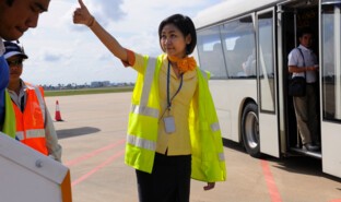 Disembarking passengers, Phnom Penh Airport, Cambodia