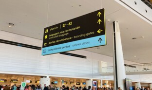 Passengers, airport signage