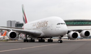 Airlines - Emirates A380 taxiing to gate at London Gatwick.jpg