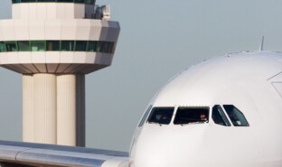 Airport facilities and infrastructure - Control tower and aircraft, Gatwick Airport.jpg