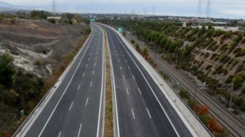 When will the new Patra-Pyrgos highway be ready?