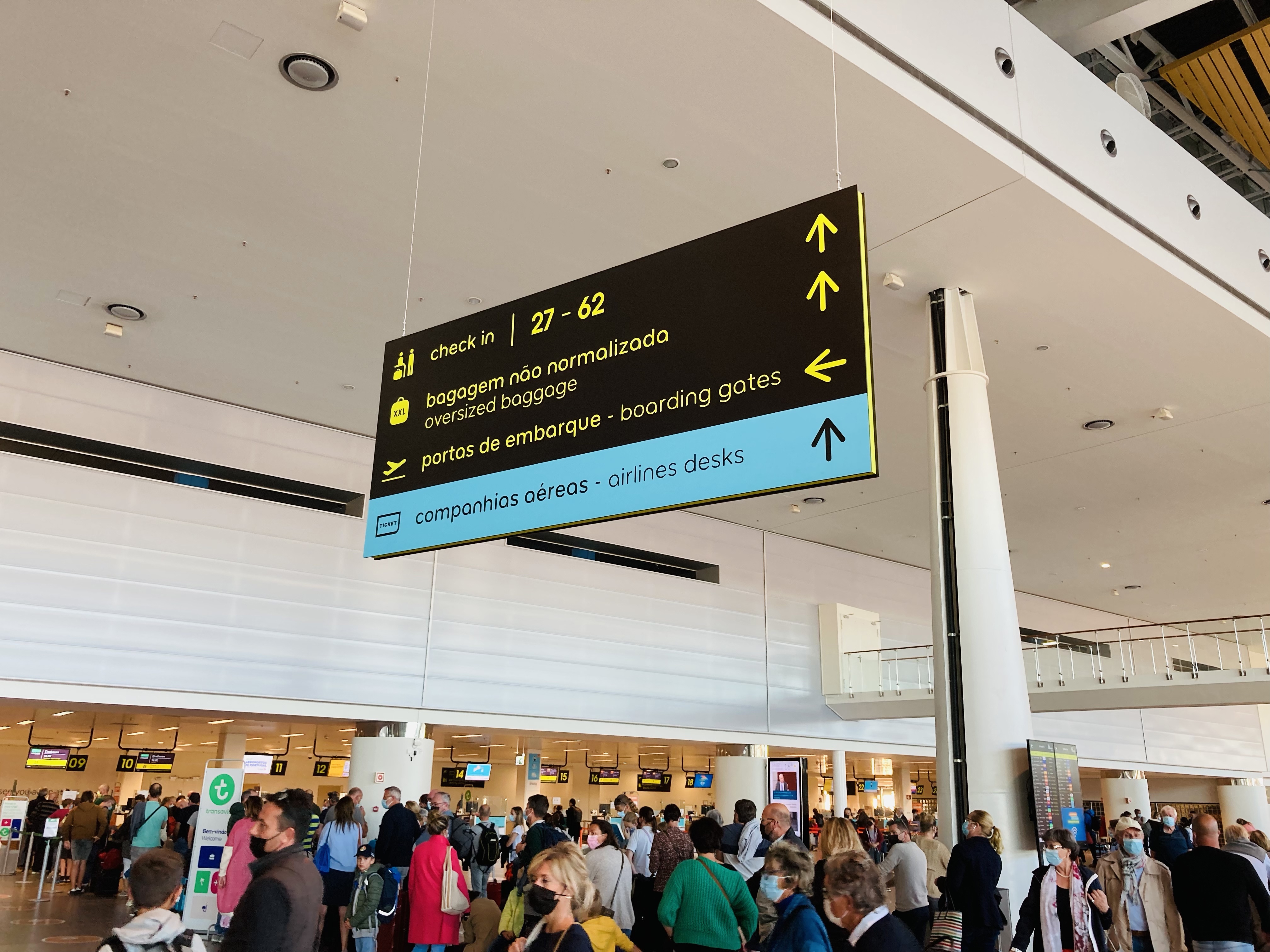 Passengers, airport signage