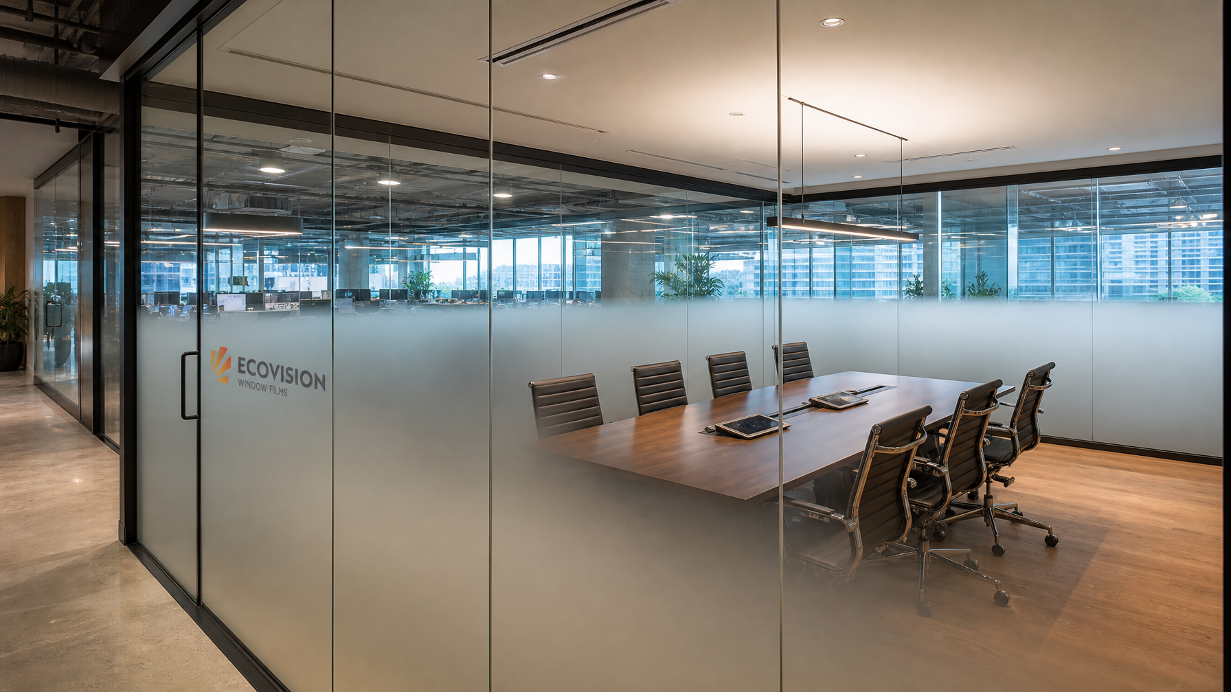 Vancouver office boardroom with gradient frosted window film on glass walls showing privacy at seated level and clear sightlines above