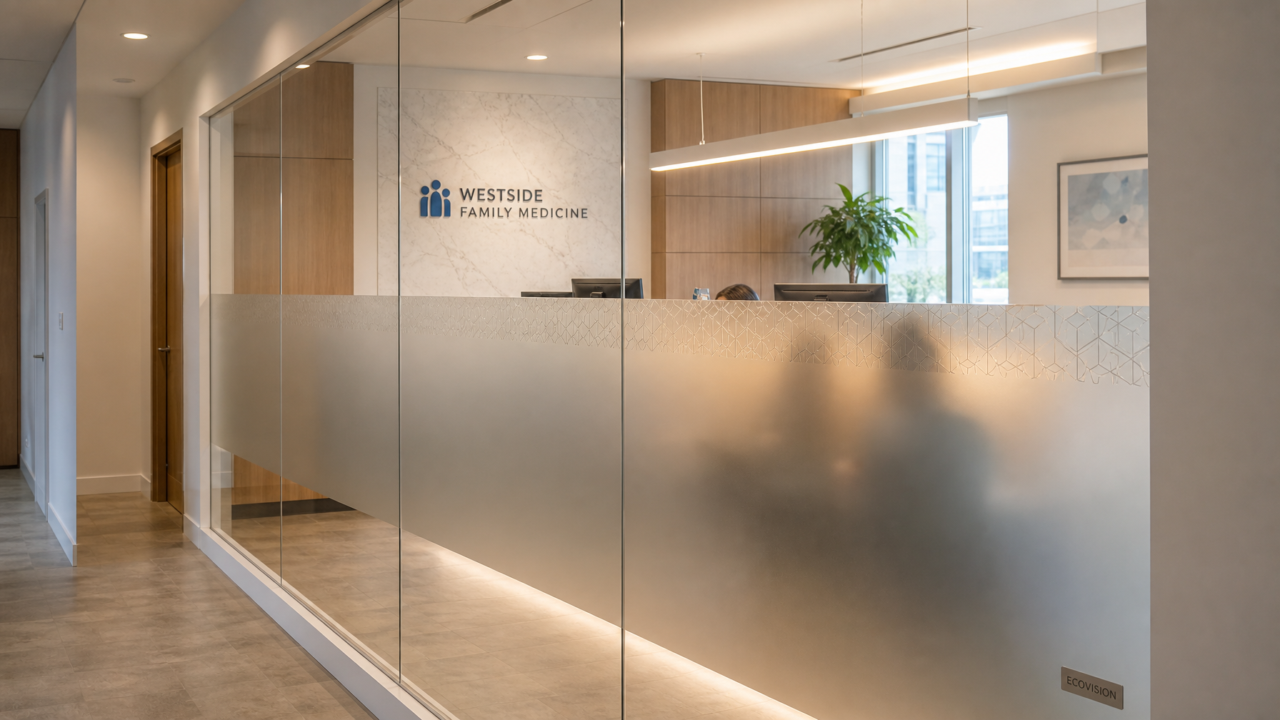 Modern healthcare clinic reception area in Vancouver with professional frosted glass privacy screen installed by Ecovision Window Films