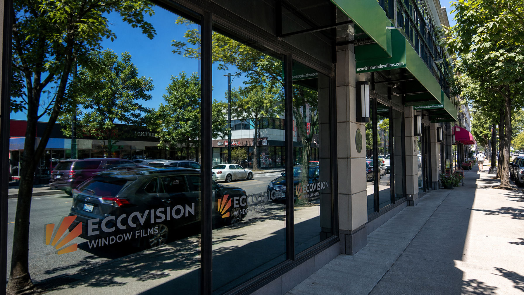 Exterior view of Vancouver commercial building with one-way mirror reflective window film showing street reflection