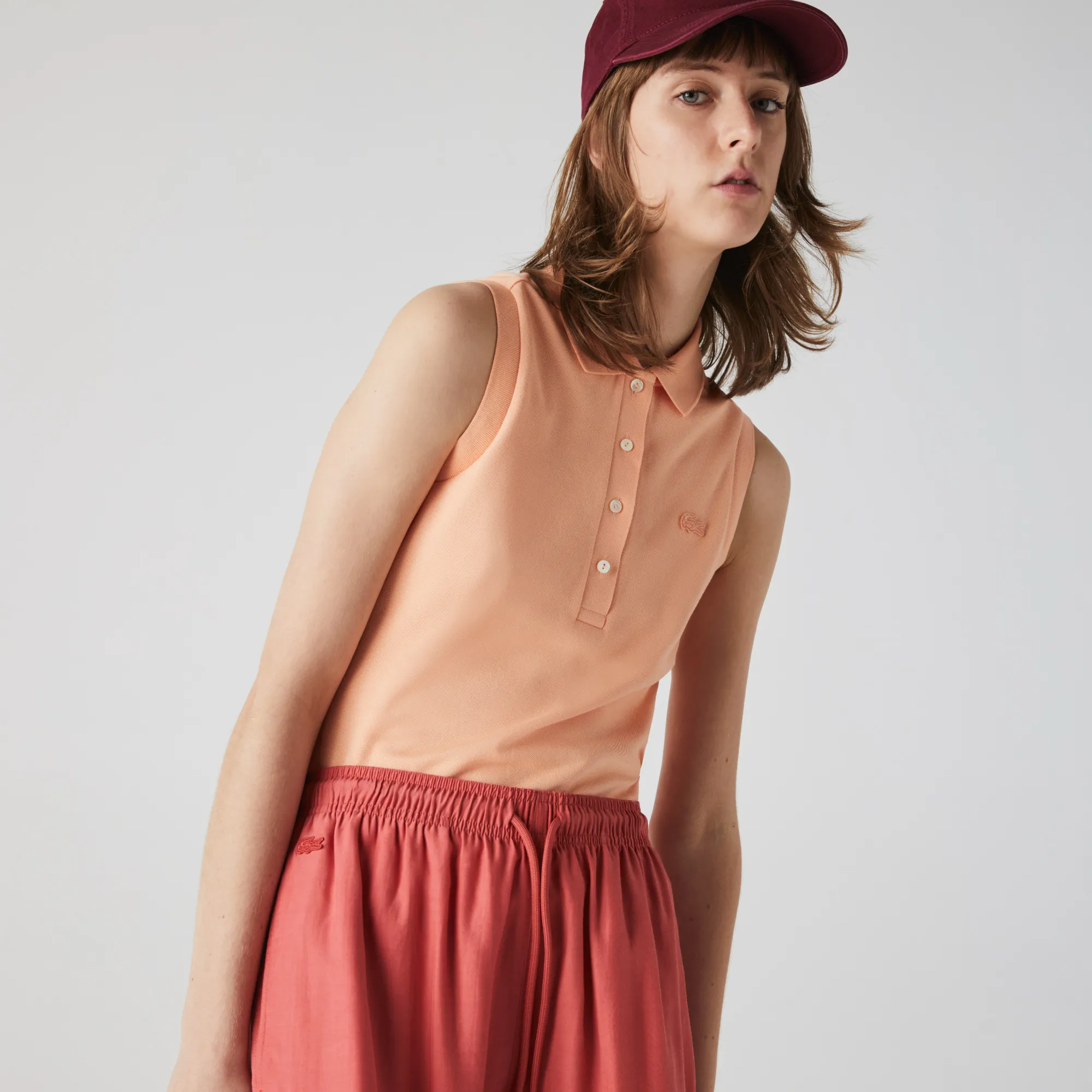 Women's Lacoste Slim fit Sleeveless Cotton Piqué Polo Shirt - Light Orange • HEB