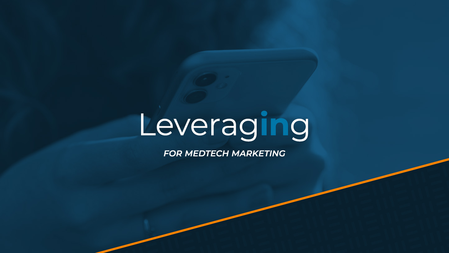 Image of a person using a smart phone with the text: Leveraging for MedTech Marketing.