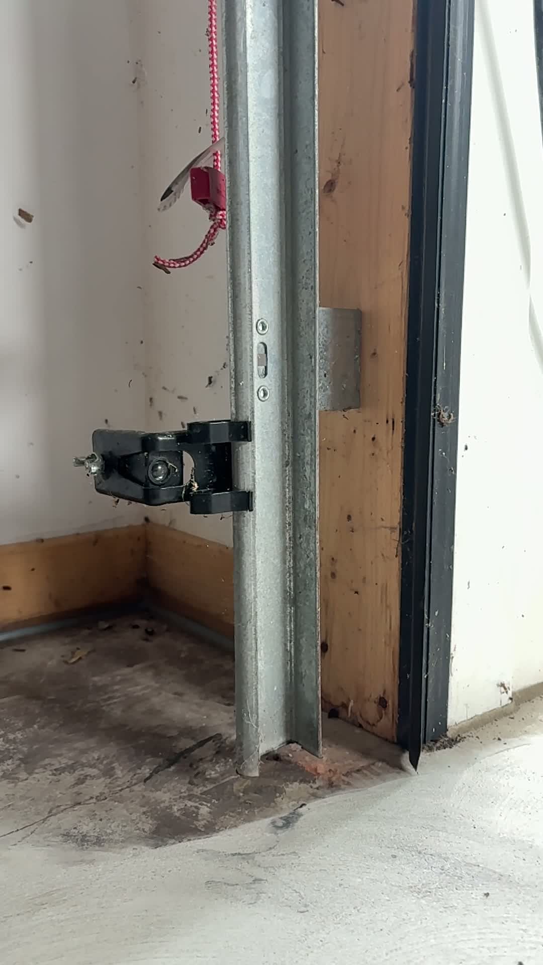 Bare concrete garage floor with vacuum equipment