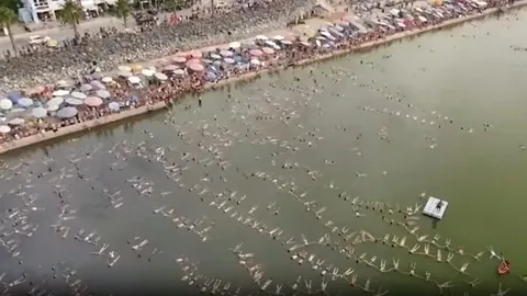 Bañistas intentan establecer un nuevo récord mundial en un lago argentino